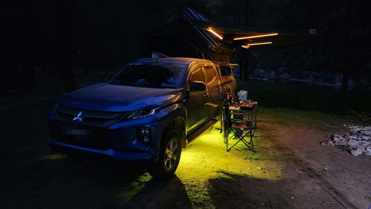 night camp with under-vehicle and awning lighting