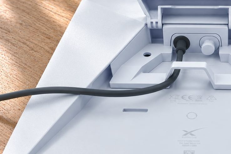 The cable's Starlink end plugged into a Starlink Mini, showing its weather seal