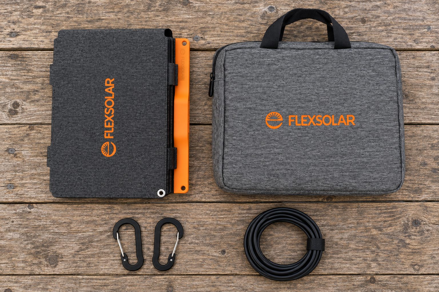 What comes with the FlexSolar S100: the folded panel, its carry bag, two carabiners and the coiled DC cable